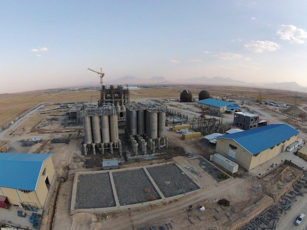 Aerial view of a large industrial processing facility — Berm Inc.'s international construction background