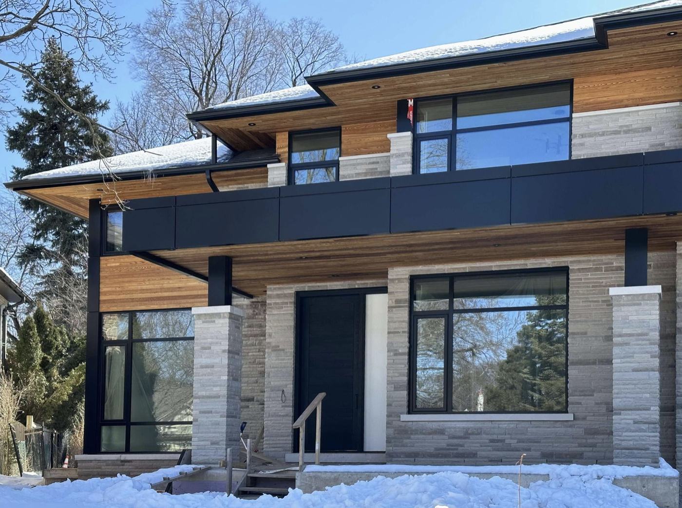 Modern two-storey custom home delivered by Berm Inc.