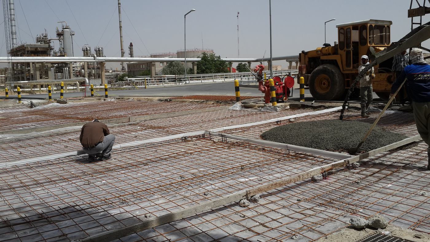Concrete slab pour with rebar mesh — Berm Inc. project photo